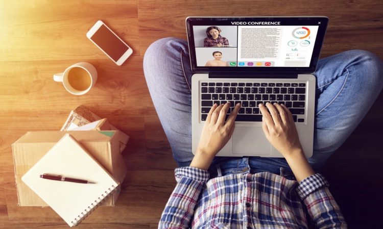 work from home. people making video conference with colleague via laptop computer during home quarantine to avoid spreading illness transmission of COVID-19 Coronavirus outbreak. Social distancing